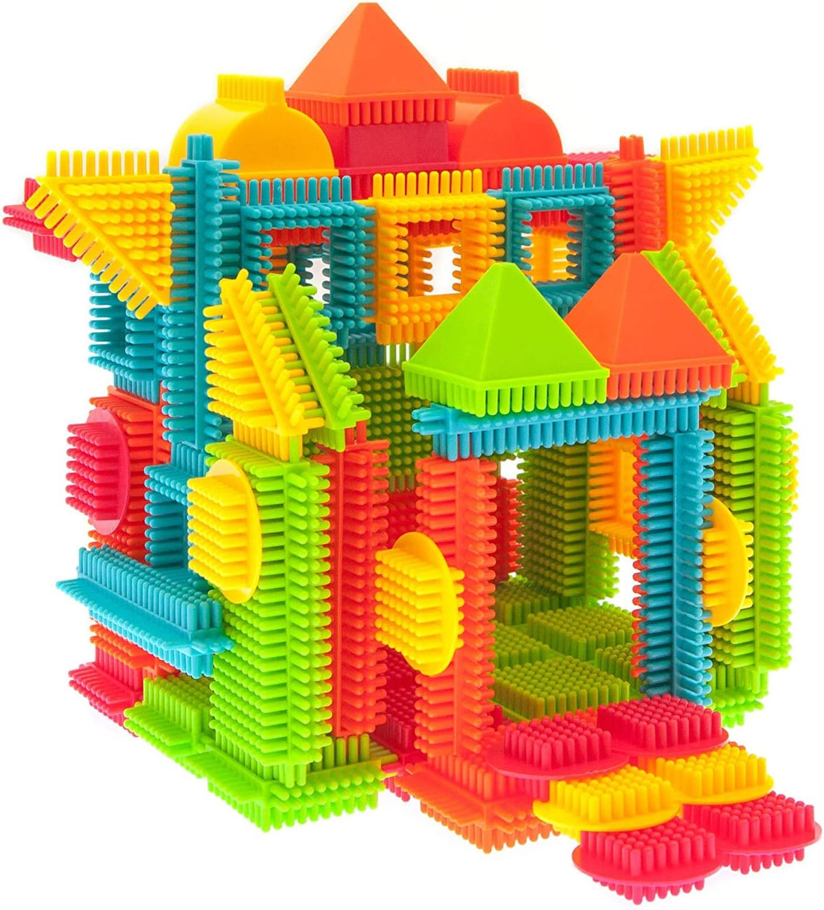 Colorful clear magnetic tiles built into a tower next to spiky hedgehog blocks