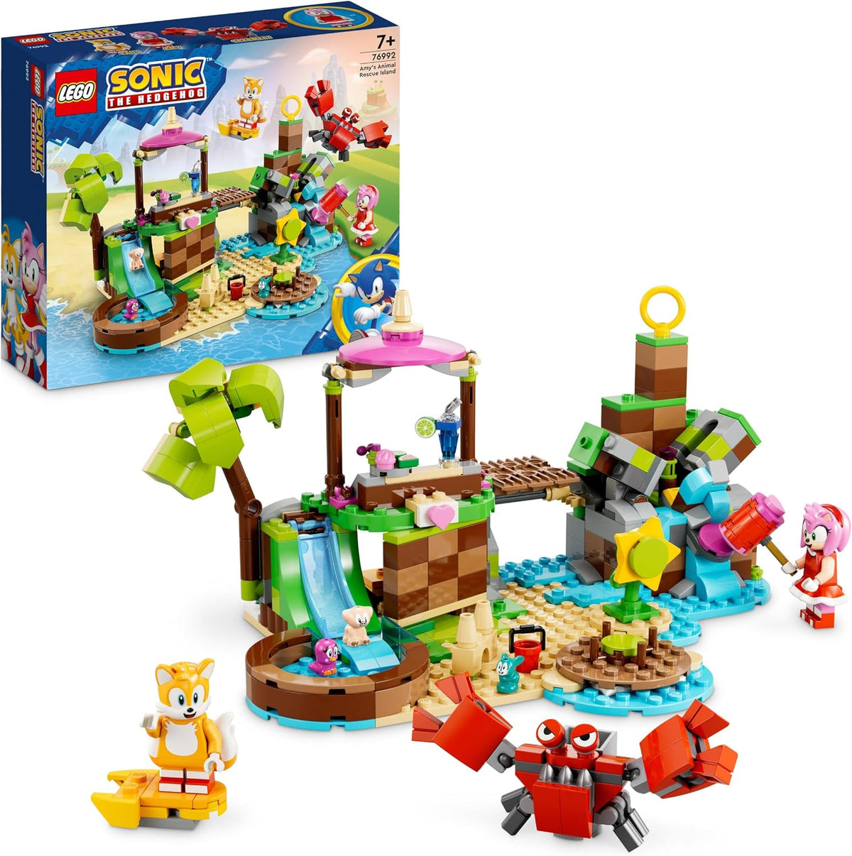 Colorful brick-built island playset with slide, pool, merry-go-round and animal figures