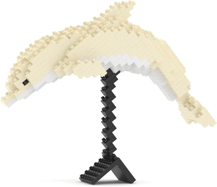 Brick-built white and pink dolphin sculpture made from small interlocking plastic blocks