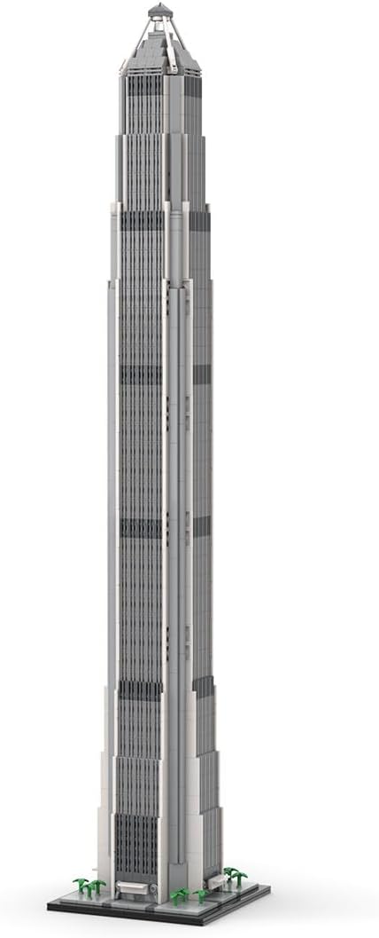 Tall brick-built Shenzhen skyscraper with tapered spire on a street base