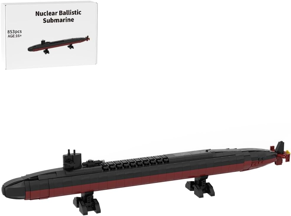 Four small brick-built gray battleship models lined up side by side – view 3