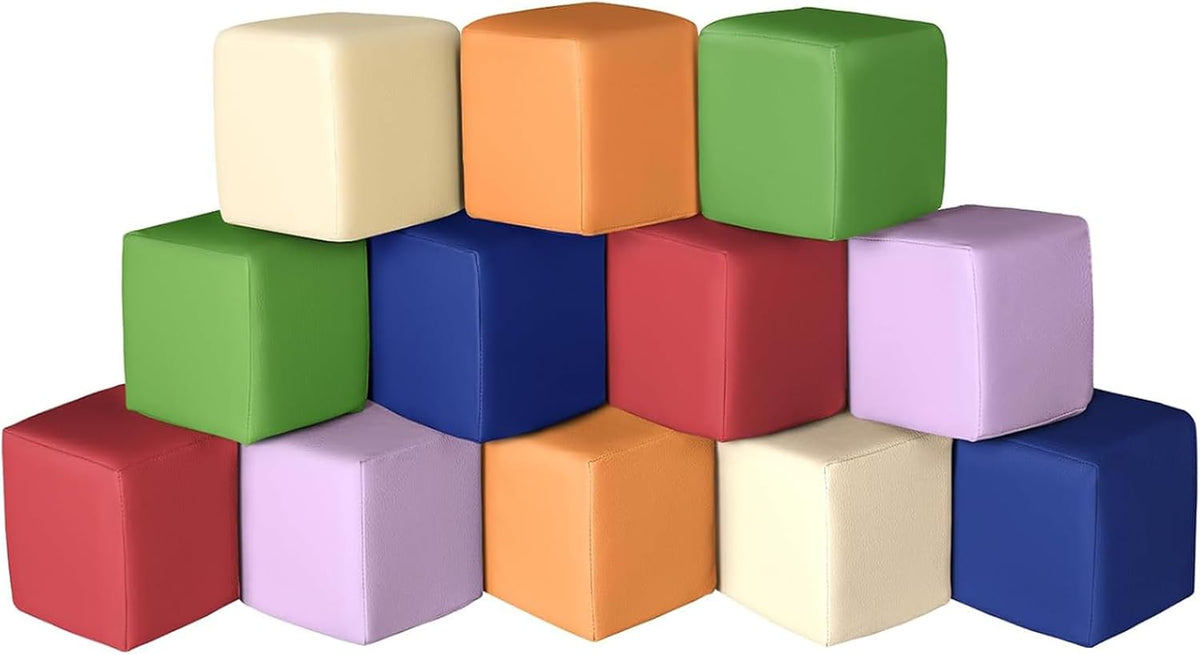 Twelve giant soft foam blocks in classic primary colors stacked into steps