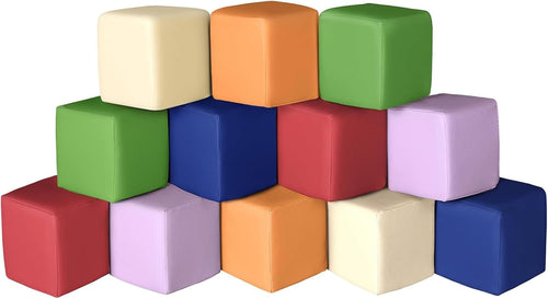 Twelve giant soft foam blocks in classic primary colors stacked into steps