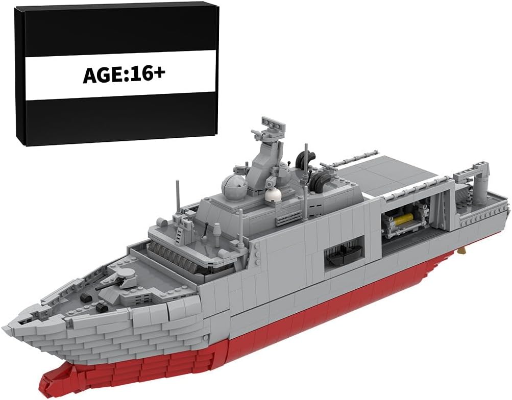 Gray brick-built aircraft carrier with flight deck and island tower – view 2
