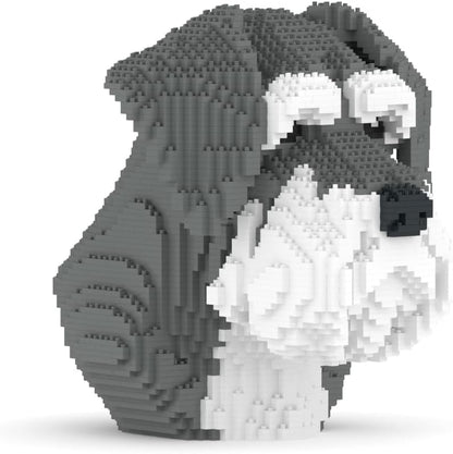 Gray and white brick-built schnauzer dog bust on a desk