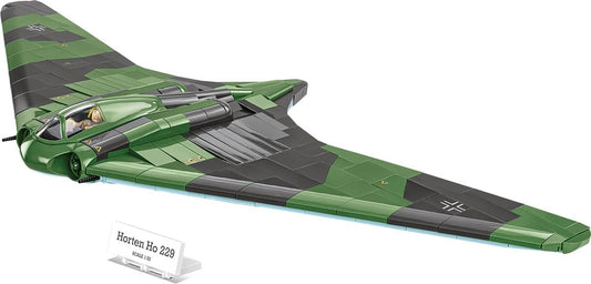 Built WWII flying-wing aircraft brick model on a presentation plate with pilot figure