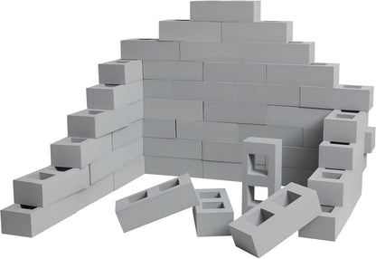 Red faux-brick foam building blocks with square and circle holes stacked into a wall – view 2
