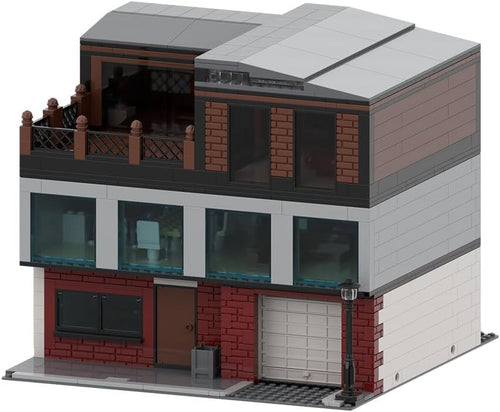Built modular modern house brick model with garage, two buildings side by side