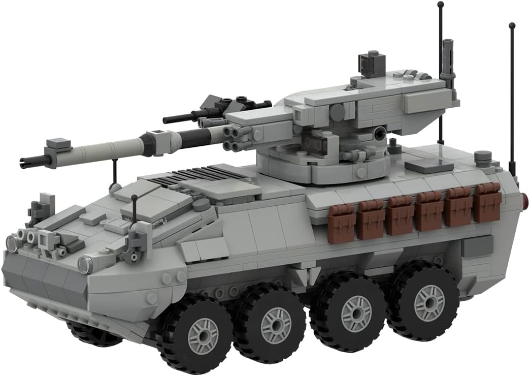 Green brick-built modern main combat tank with angular turret and long gun – view 4