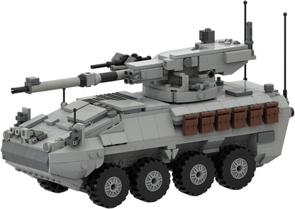 Green brick-built modern main combat tank with angular turret and long gun – view 4