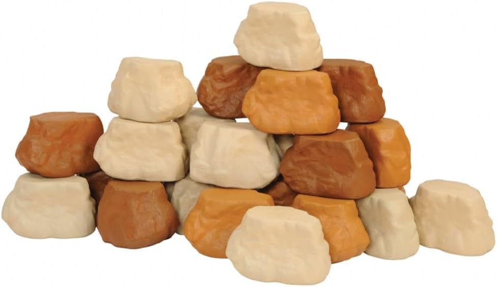 Gray foam pretend rocks stacked into a low wall