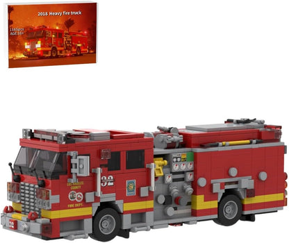 Brick-built red aerial ladder fire truck with yellow stripes and raised ladder – view 3