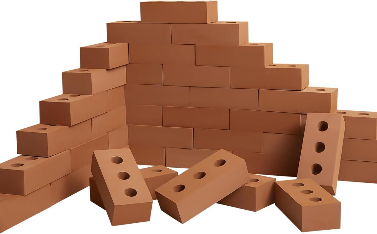 Red faux-brick foam building blocks with square and circle holes stacked into a wall – view 3