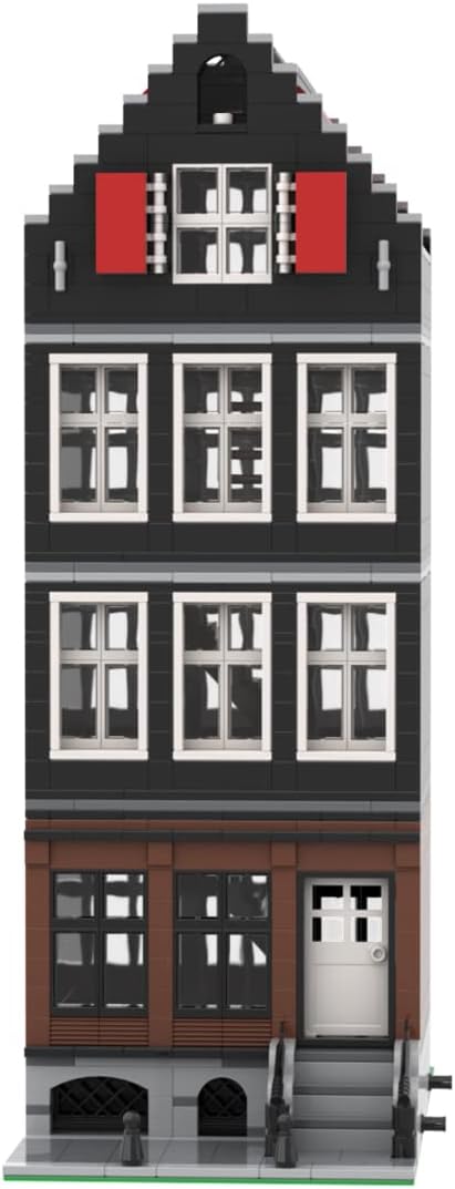 Narrow brick-built Amsterdam canal house with gabled roof and tall windows