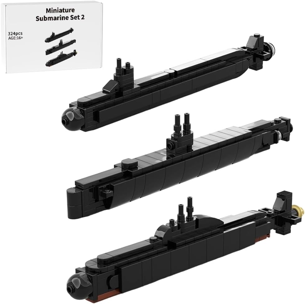 Four small brick-built gray battleship models lined up side by side – view 5