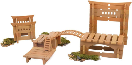 Wooden notched blocks assembled into an Eastern-style pagoda on a tabletop