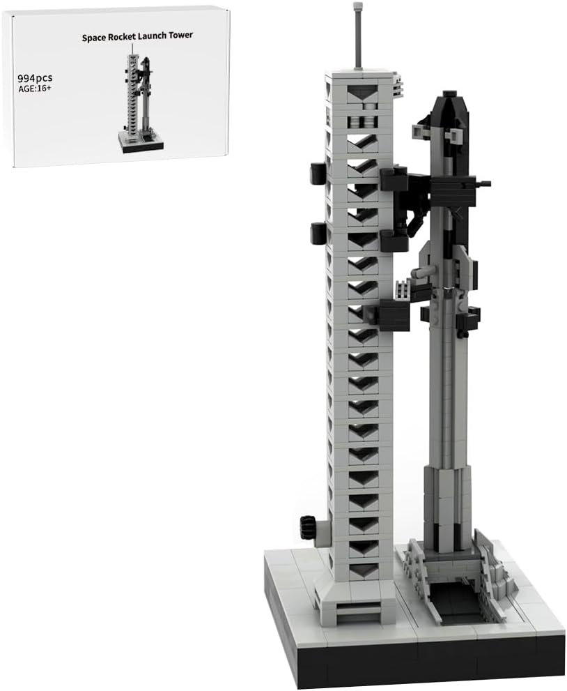 Tall white and silver brick-built space rocket with separating stages on a launch stand – view 2