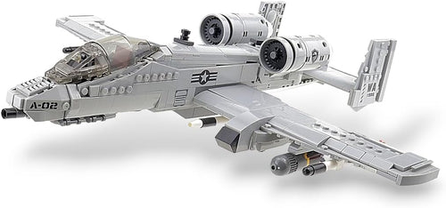 Gray brick-built twin-engine ground attack jet with straight wings