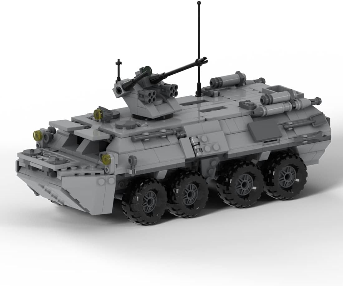 Green brick-built modern main combat tank with angular turret and long gun – view 3
