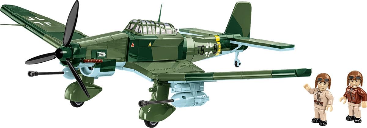 Brick-built WWII dive bomber with gull wings and underwing cannons on a clear display rod