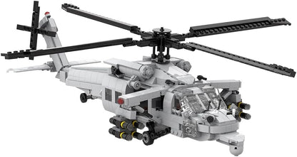 Gray brick-built naval maritime helicopter with four-blade rotor – view 2