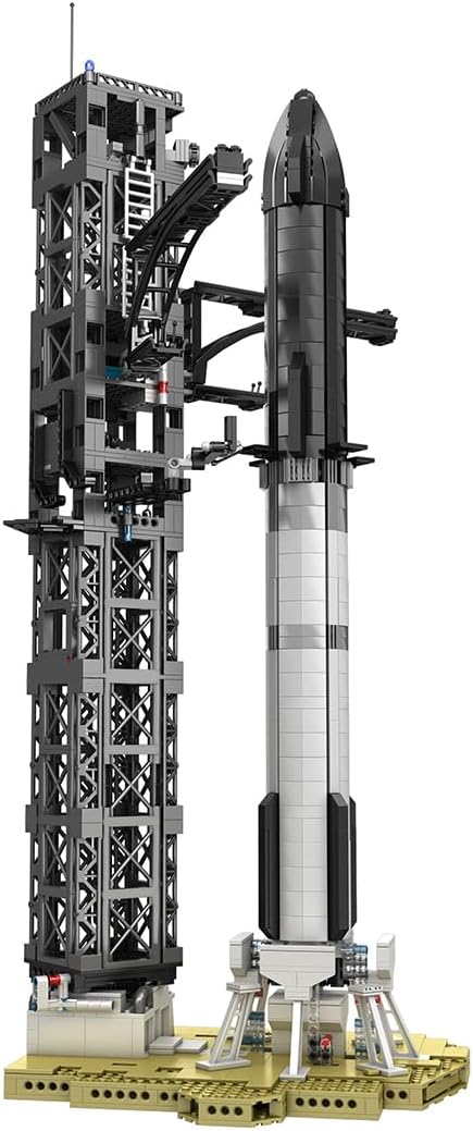 Tall white and silver brick-built space rocket with separating stages on a launch stand