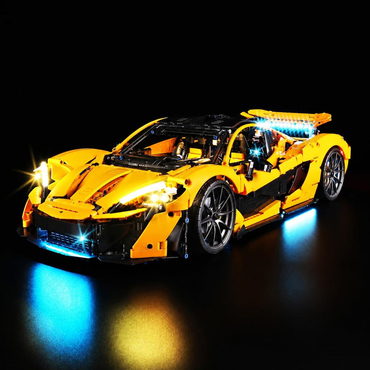Hybrid hypercar technical brick model with glowing headlights from an LED light kit