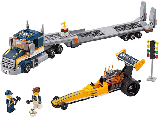 Built transporter truck with trailer carrying a dragster race car