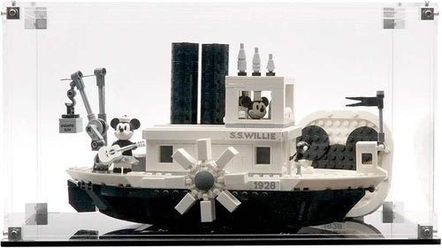 Clear acrylic display case over a vintage steamboat brick model