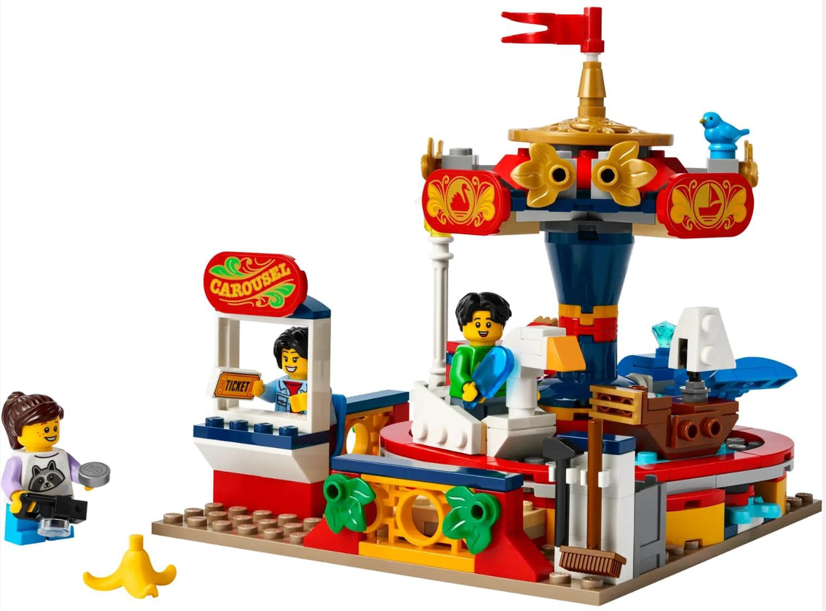 Brick-built colorful carousel with swan, boat, whale and fire truck floats