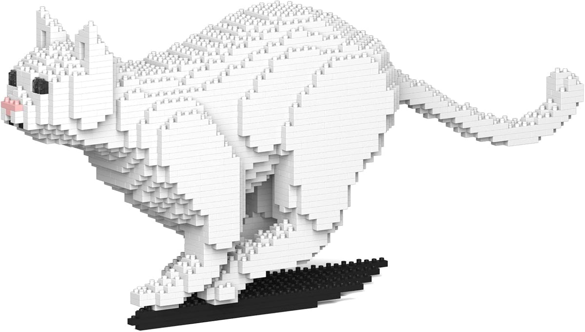 Brick-built orange tabby cat sculpture sitting upright – view 2
