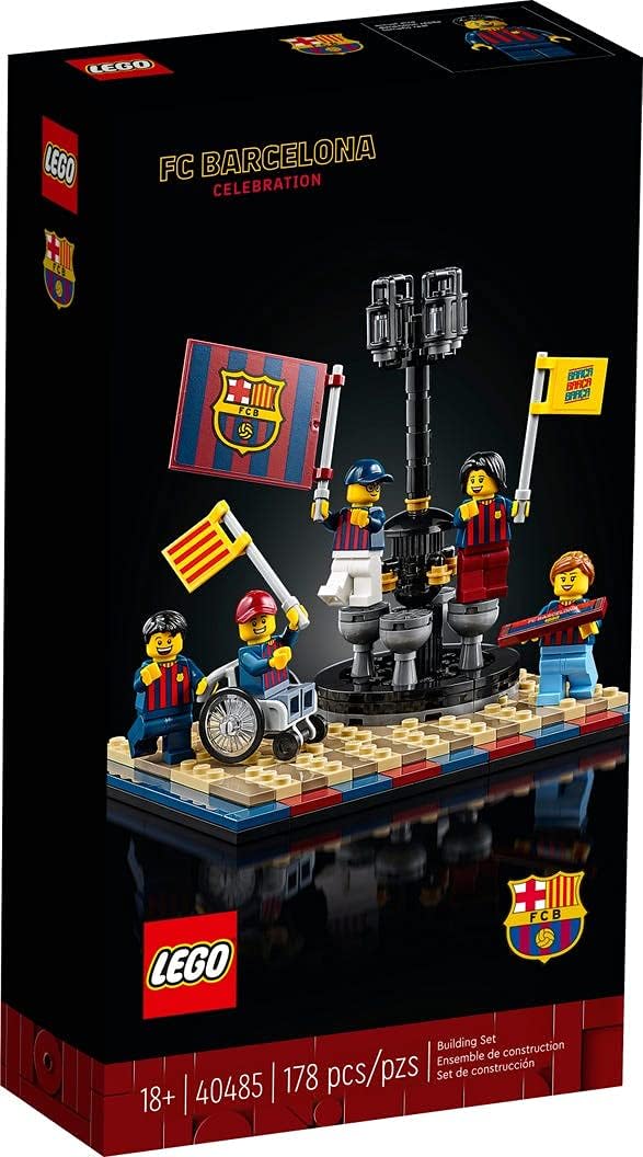 Small brick-built soccer celebration scene with five player figures