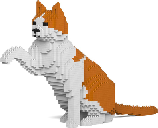 Orange and white cat brick sculpture sitting