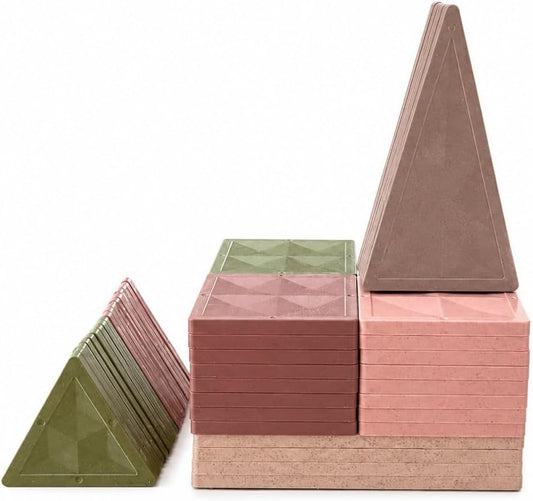 Rose and neutral toned wheat straw magnetic tiles built into a small house