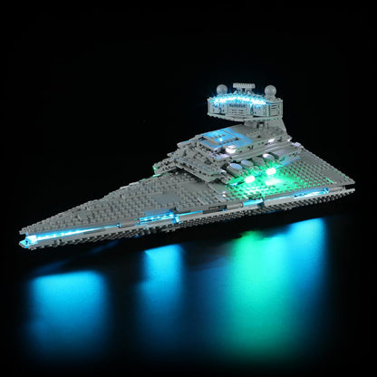 Large wedge-shaped gray brick warship glowing with blue LED engine lights – view 2