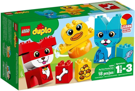 Large toddler bricks built into a yellow bird, blue cat and red dog