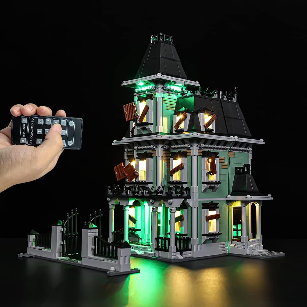 Brick-built haunted house glowing with eerie LED lights at night