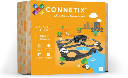 Magnetic road tiles laid out as a small street layout