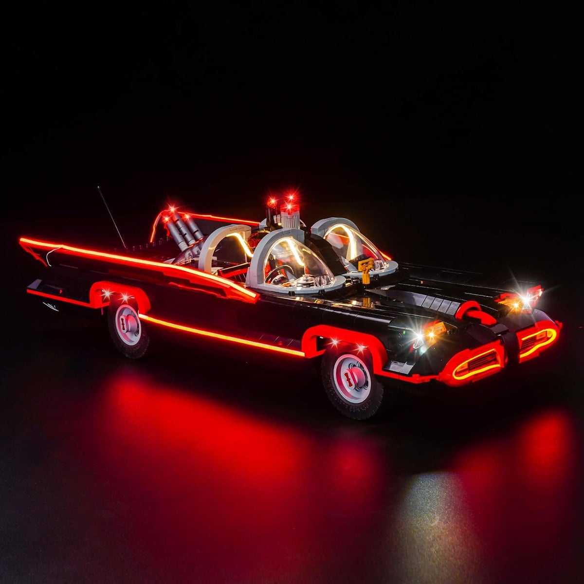Black brick-built classic superhero car with glowing LED headlights and exhaust – view 2
