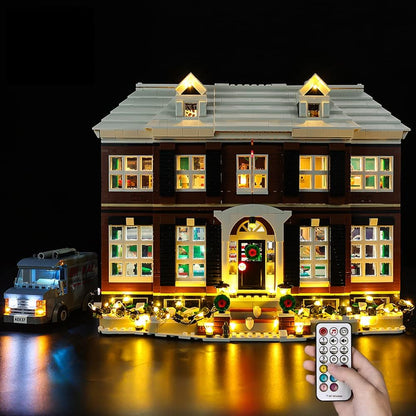 Holiday family house brick model glowing with installed LED lights