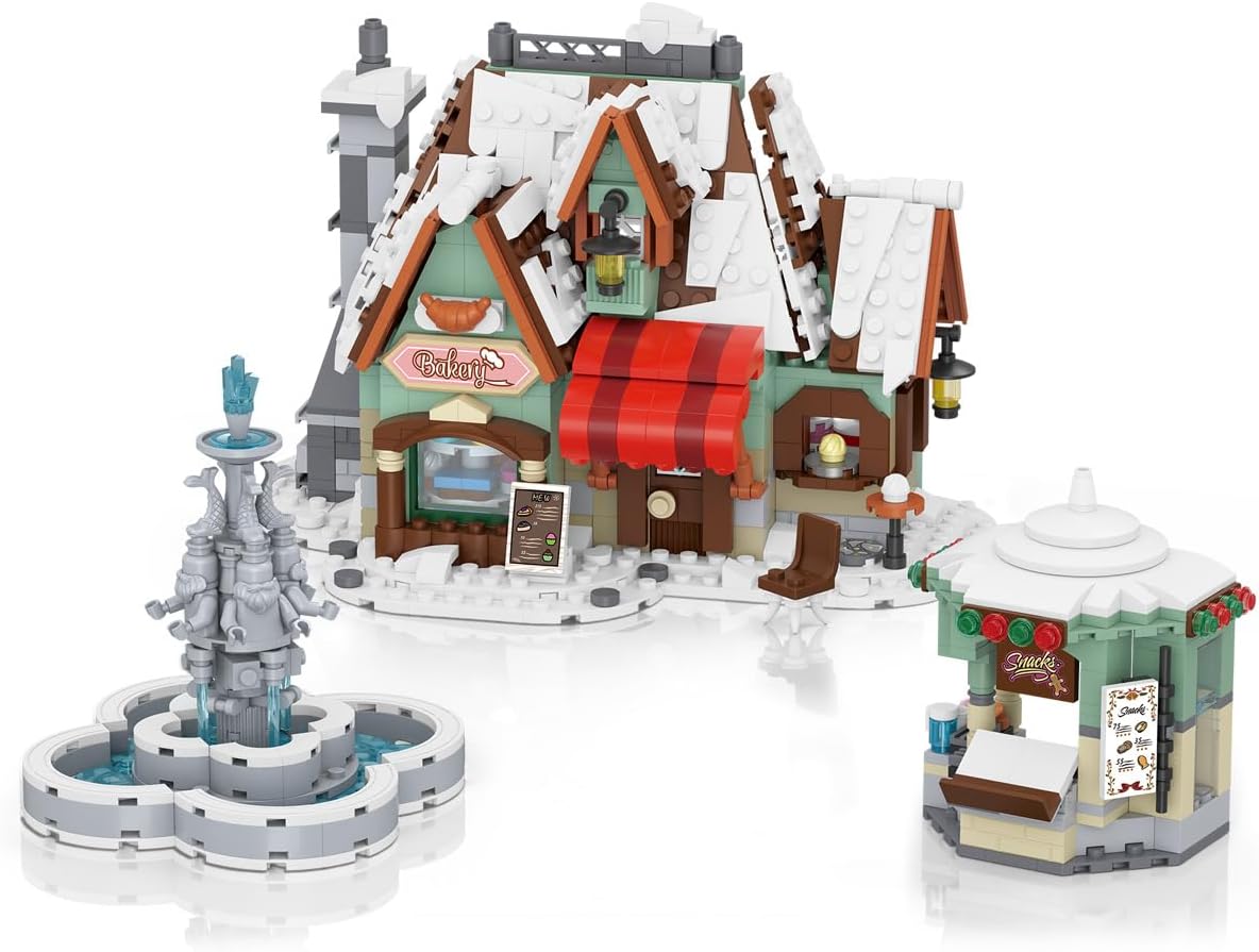 Built snowy holiday bakery with red awning, fountain and snack stand