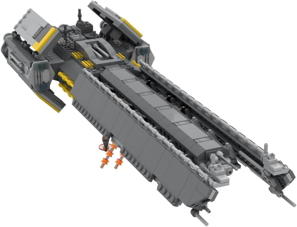 Long dark gray brick spaceship with yellow trim, turrets and rear engines
