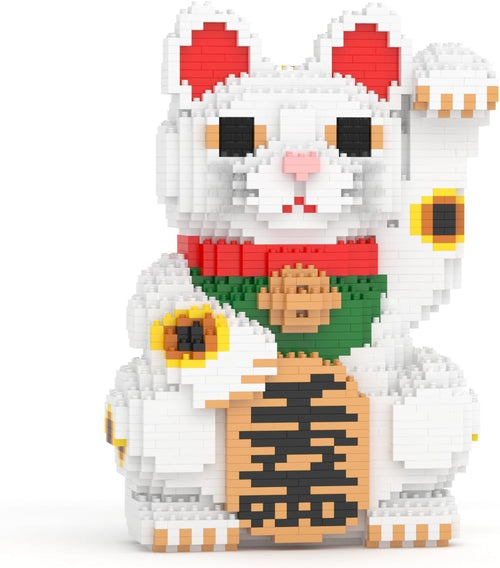 Brick sculpture of a white Japanese lucky cat raising one paw
