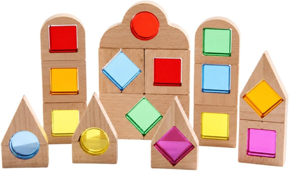 Wooden geometric blocks with colored acrylic windows stacked in sunlight