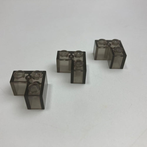 Pile of transparent black 2x6 building bricks