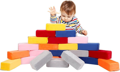 Colorful large soft foam blocks stacked into a small tower