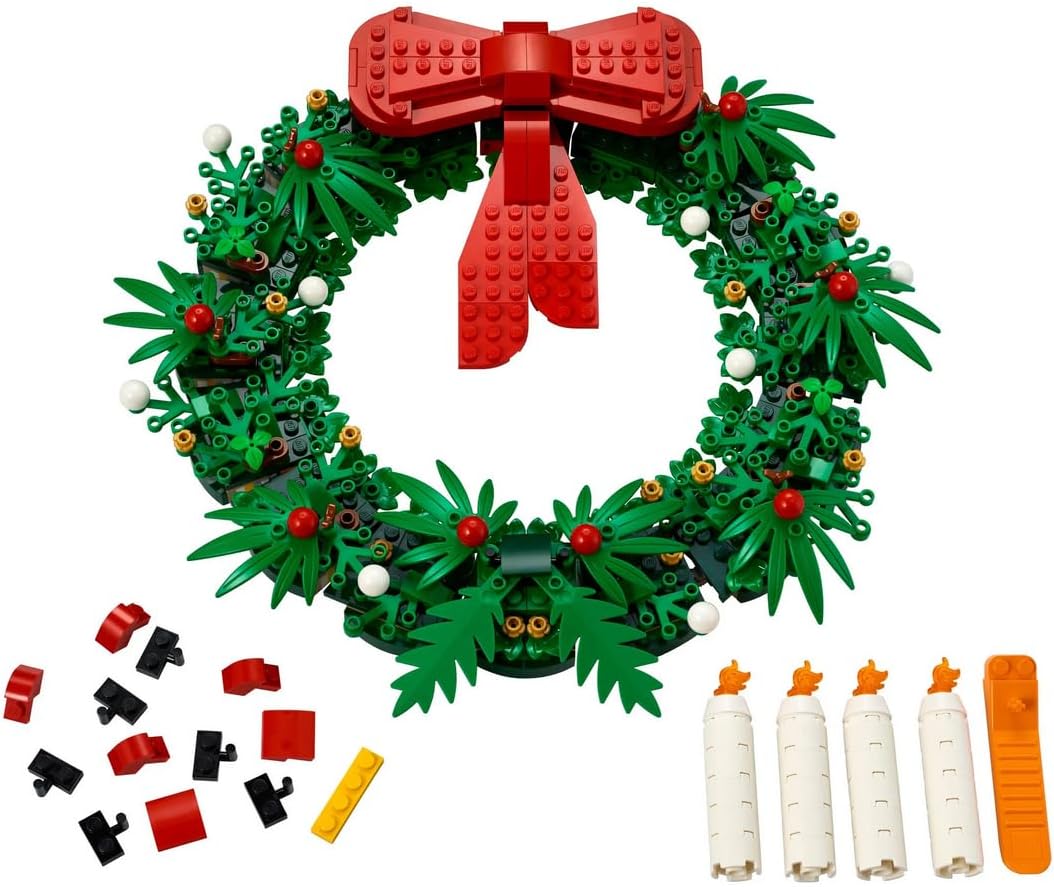Brick-built green Christmas Advent wreath with red bows and four candles