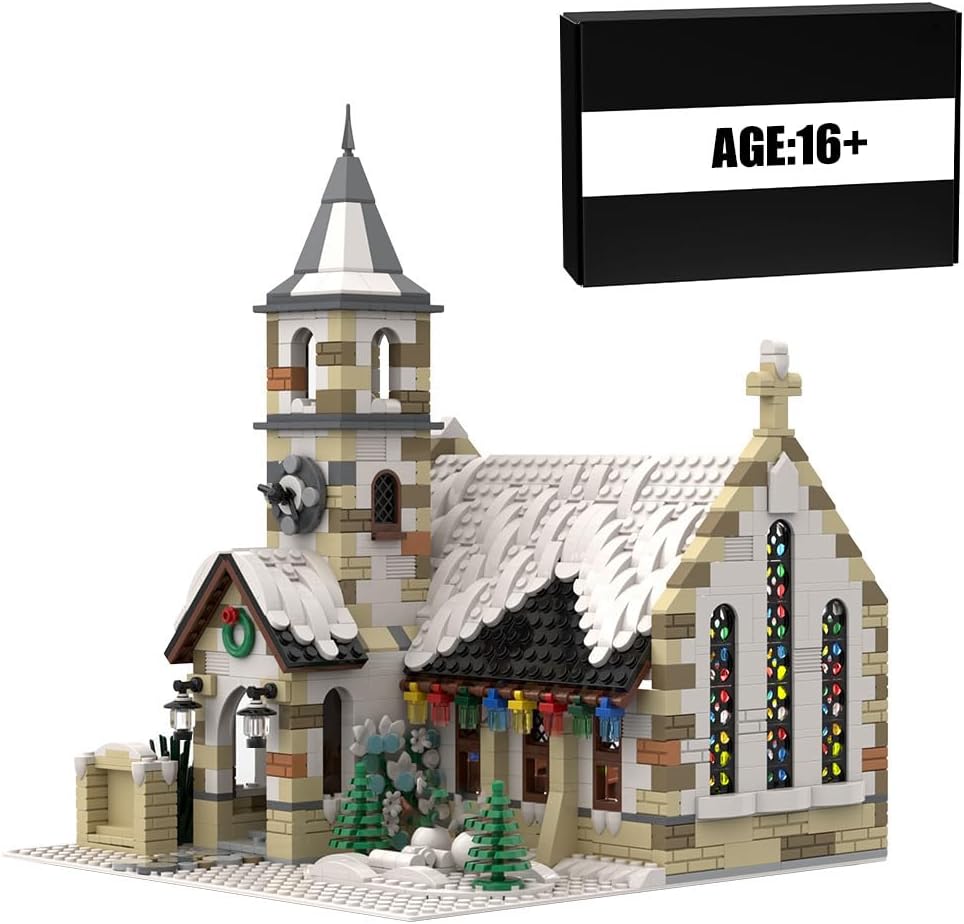 Snow-covered brick-built country church with bell tower and arched windows