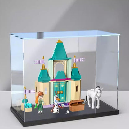 Clear acrylic display case with printed backdrop around a small castle model – view 2