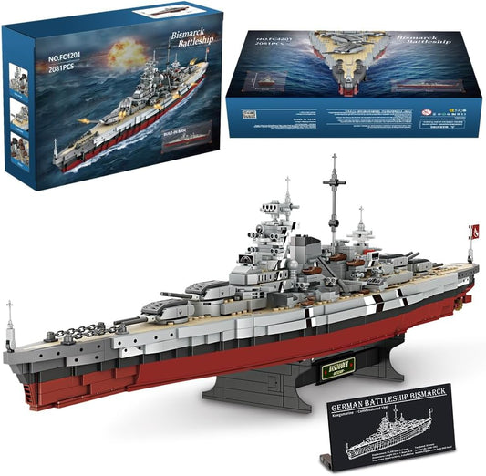 Brick WWII battleship model with main gun turrets on a display base